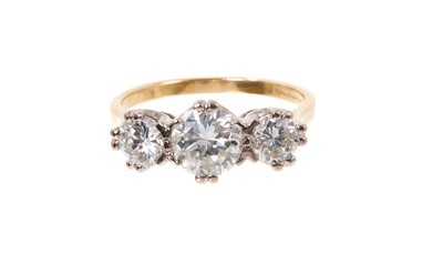 Lot 726 - Diamond three stone ring with three round brilliant cut diamonds in claw setting on 18ct yellow gold shank. Estimated total diamond weight approximately 1.70cts. Ring size N.