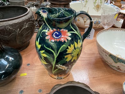 Lot 622 - Pru Green Wivenhoe pottery jug decorated with flowers and foliage