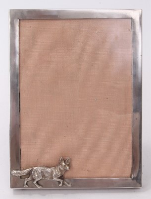 Lot 481 - Hunting interest- George V silver photograph frame of rectangular form with fox applique