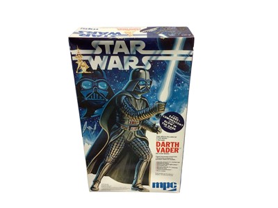 Lot 123 - MPC Star Wars Darth Vader model kit, contents sealed Q1-1916, Waddington's Star Wars 350 35cm x 49 cm jigsaw No.194 A, contents open and Star Wars pillow case (3)