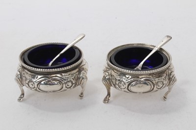 Lot 548 - Pair of Victorian table salts (London 1882) and two spoons (Birmingham 1933)