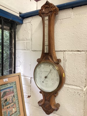 Lot 693 - Aneroid barometer in carved frame by Maurice Cohen & Co