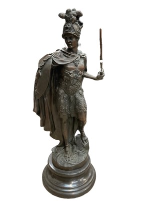 Lot 282 - Late 19th century style bronze sculpture of a gladiator with helmet and sword, on a circular black marble/slate plinth, 71cm