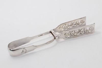 Lot 509 - Pair of Edwardian silver fiddle pattern asparagus tongs