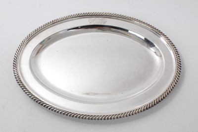 Lot 545 - Victorian silver plated serving dish of oval form, with engraved coat of arms, engraved initials and date- 1887 to reverse, 41cm in length.