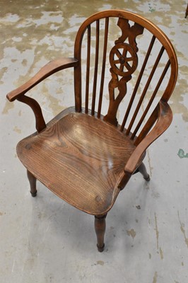 Lot 1615 - 19th century yew and elm wheel back Windsor chair