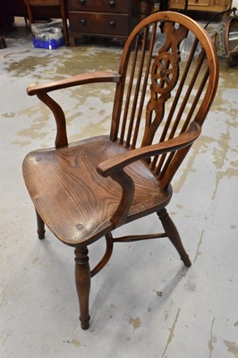 Lot 1615 - 19th century yew and elm wheel back Windsor chair