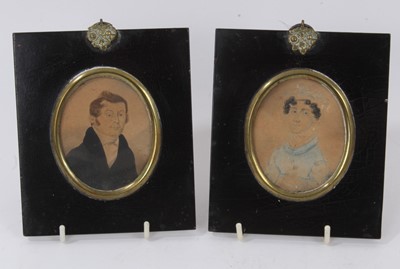 Lot 1127 - Pair of early 19th century portrait miniatures on paper in papier mâché frames