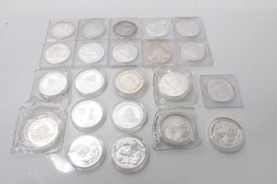 Lot 409 - China - Mixed 1oz fine silver Panda Ten Yuan coins (22 coins)