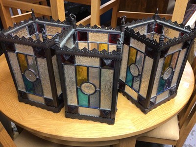 Lot 813 - Three Gothic style stained glass lanterns, formerly hanging outside a pub