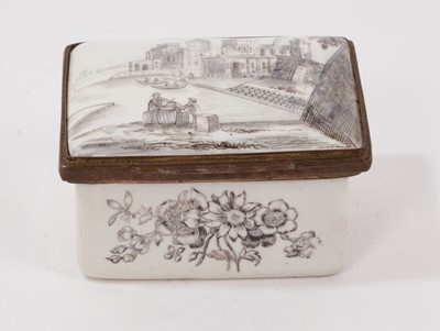 Lot 1089 - An enamel rectangular box, printed with a landscape and flowers, circa 1770