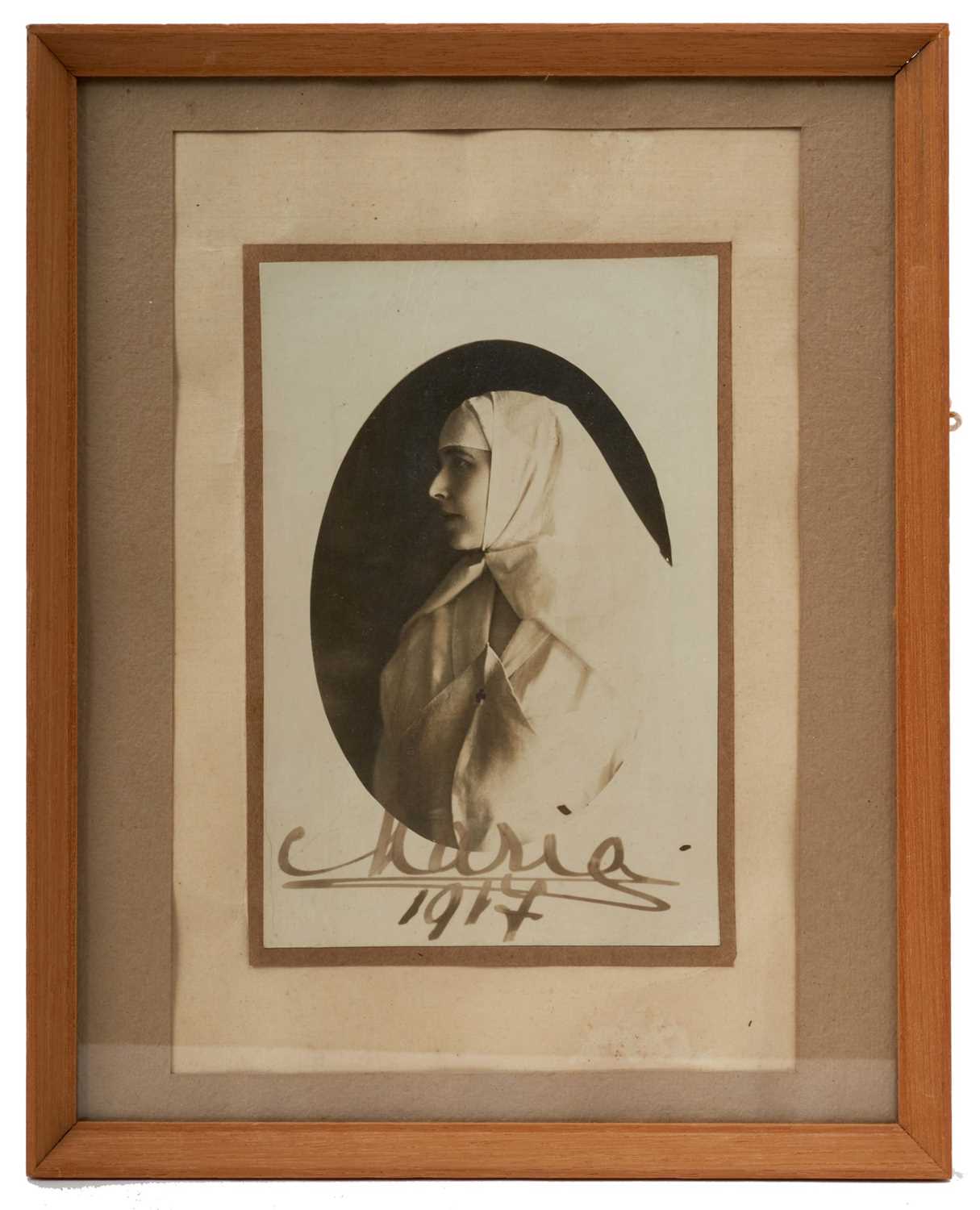 Lot 73 - H.I.H. Grand Duchess Maria Romanov of Russia, rare signed portrait photograph of the Princess in First World War nurses uniform