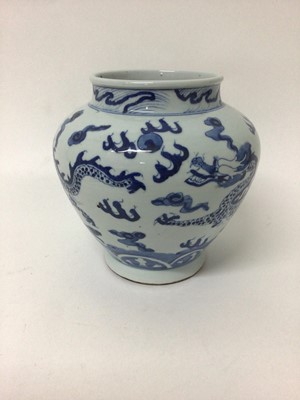 Lot 12 - Chinese blue and white porcelain vase with dragon decoration