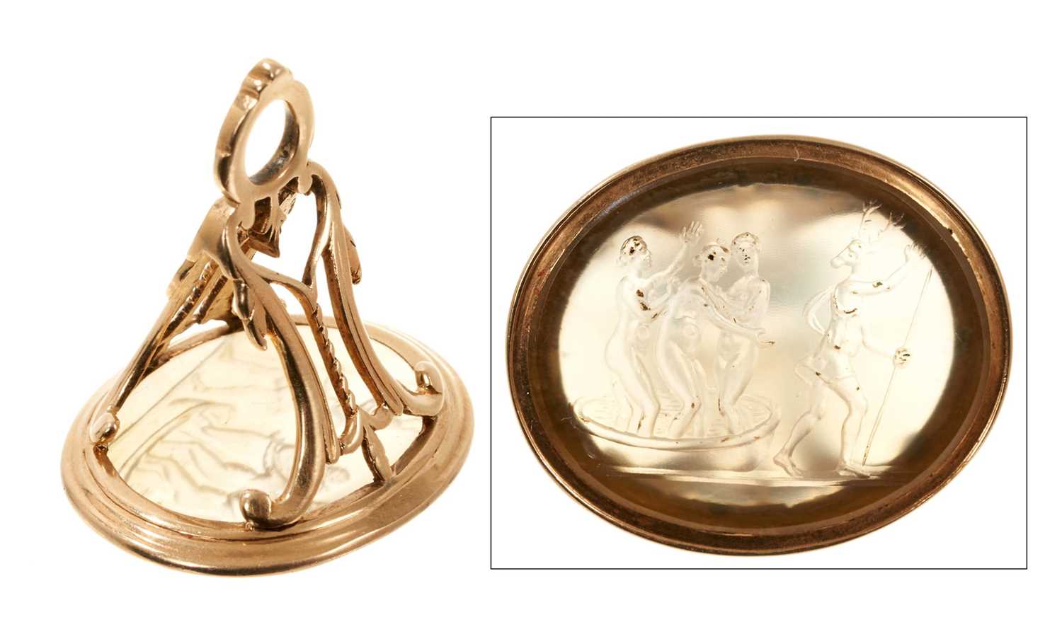 Lot 811 - George III yellow gold fob seal, containing an 18th century or earlier chalcedony intaglio depicting Diana bathing with nymphs and Acteon transformed as a stag.