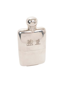 Lot 593 - Late Victorian silver crested spirit flask