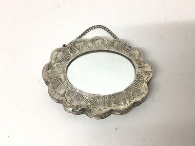 Lot 89 - Eastern white metal cased small mirror