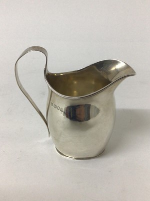 Lot 149 - Georgian-style silver helmet shaped milk jug