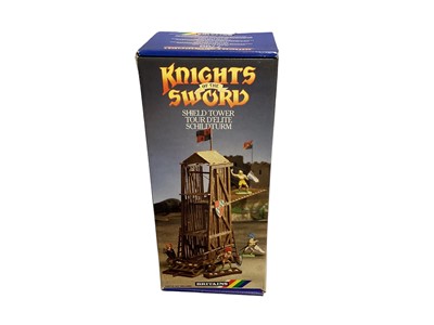 Lot 165 - Britains Knights of the Sword Shield Tower (x2), boxed No.7789 & Catapult, on card with blister pack No.7785 (3)