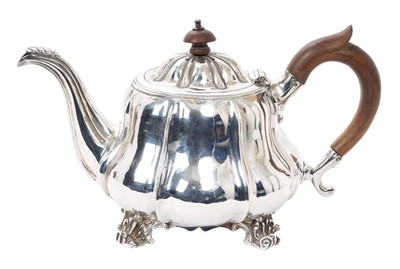 Lot 449 - George IV silver tea pot of compressed baluster form