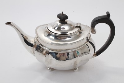 Lot 447 - George V silver teapot on ball feet