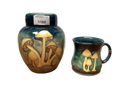 Lot 1160 - Moorcroft pottery ginger jar decorated in the Fairy Rings pattern, together with a matching mug (2)