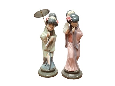 Lot 1155 - Two Lladro porcelain figures - Geisha girls, together with five Lladro angels (7)