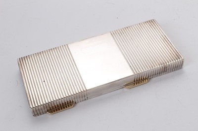Lot 581 - 1940s Cartier ladies' Art Deco combined silver cigarette case and compact in original leather covered case