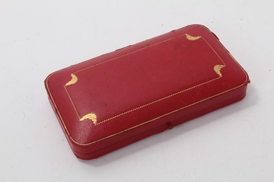 Lot 581 - 1940s Cartier ladies' Art Deco combined silver cigarette case and compact in original leather covered case