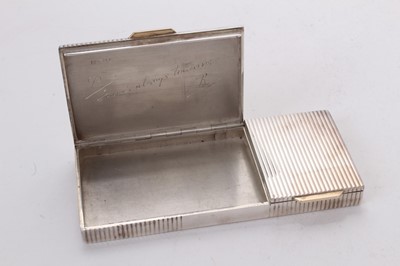 Lot 581 - 1940s Cartier ladies' Art Deco combined silver cigarette case and compact in original leather covered case