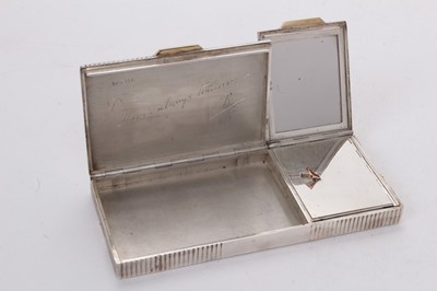 Lot 581 - 1940s Cartier ladies' Art Deco combined silver cigarette case and compact in original leather covered case