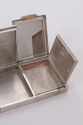 Lot 581 - 1940s Cartier ladies' Art Deco combined silver cigarette case and compact in original leather covered case