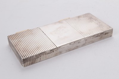 Lot 581 - 1940s Cartier ladies' Art Deco combined silver cigarette case and compact in original leather covered case