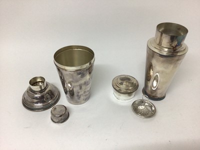 Lot 114 - Two silver plated cocktail shakers, Dunhill and Mappin & Webb