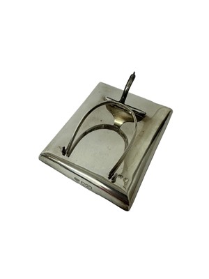 Lot 1247 - Goldsmiths and Silversmiths silver desk weight with sprung silver spur paper clip