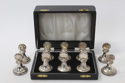 Lot 436 - Six silver menu holders in a fitted case, plus four others.