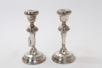 Lot 435 - Pair of contemporary silver candlesticks