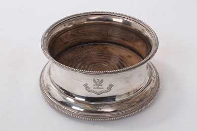 Lot 433 - Large George V silver wine coaster