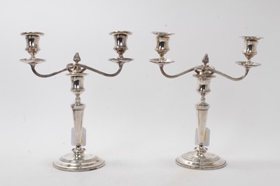 Lot 430 - Pair of Edwardian silver candelabra, one damaged