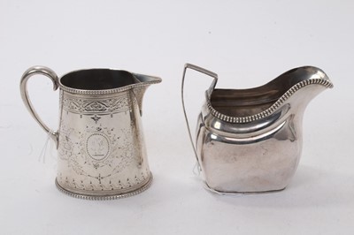 Lot 428 - Victorian silver cream jug and a George III cream jug