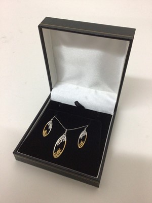 Lot 13 - 9ct white and yellow gold pendant and earrings with tree design, on a 9ct white gold chain, in box.