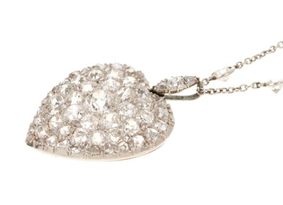Lot 667 - Antique diamond heart shape pendant necklace, the large heart shape pendant with pavé-set old cut and rose cut diamonds, the reverse enclose by a glazed locket compartment, suspended from a diamond...
