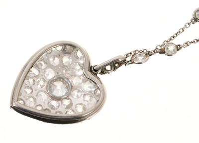 Lot 667 - Antique diamond heart shape pendant necklace, the large heart shape pendant with pavé-set old cut and rose cut diamonds, the reverse enclose by a glazed locket compartment, suspended from a diamond...