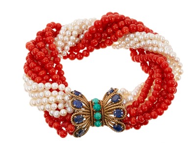 Lot 667 - Coral and cultured pearl multi-strand bracelet with a 14ct gold blue sapphire and turquoise clasp, approximately 17.5cm length.