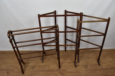 Lot 1572 - Three antique mahogany towel rails