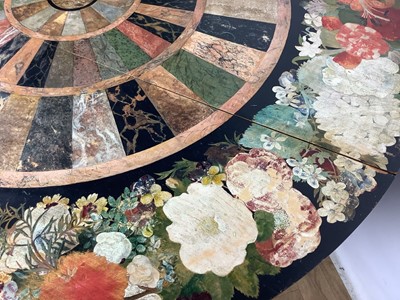 Lot 1593 - Unusual Regency ebonised and faux pietra dura breakfast table, the circular tilt top, painted with floral border and concentric faux specimen marble panels, on facetted column and triform platform...