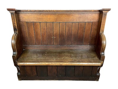 Lot 1596 - Victorian oak pew, with hinged seat and high ledge back, tracery ornament to the solid ends, 132cm long