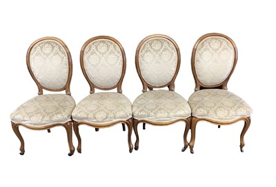 Lot 1606 - Four 19th century rosewood French salon chairs standing on cabriole legs.  The oval backs with upholstered centre panels