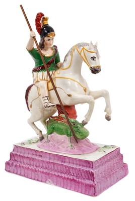 Lot 218 - A rare Staffordshire pearlware glazed figure of St. George slaying the dragon, circa 1840, polychrome decorated, on a stepped pink lustre base, 33cm high x 22.5cm base length