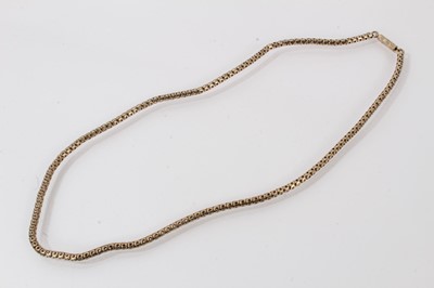 Lot 682 - Victorian yellow metal chain/necklace, the articulated snake links decorated with pierced stars on engraved barrel clasp, 40cm.