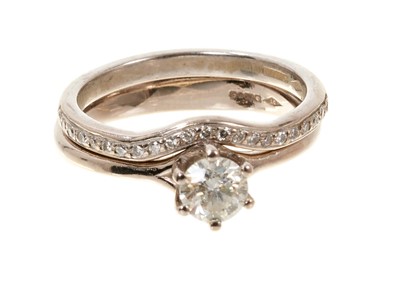 Lot 800 - Diamond single stone ring with a brilliant cut diamond estimated to weigh approximately 0.50ct in six claw setting on 18ct white gold shank, together with a matching diamond set band, both hallmark...